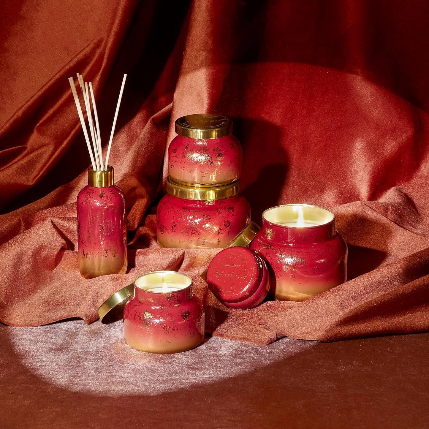 Capri Blue Glimmer Petite Signature Jar Candle - Apple Cider Social Scented Candle with Ombre Glass Candle Holder - Luxury Aromatherapy Candle - Red and Gold (8 oz)